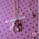 Collier fantaisie argent&eacute; avec perchoir oiseau et noeud