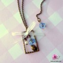Collier fantaisie bronze avec perchoir &agrave; oiseau et noeud