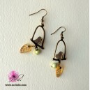 Boucles fantaisie perchoir oiseau profil bronze